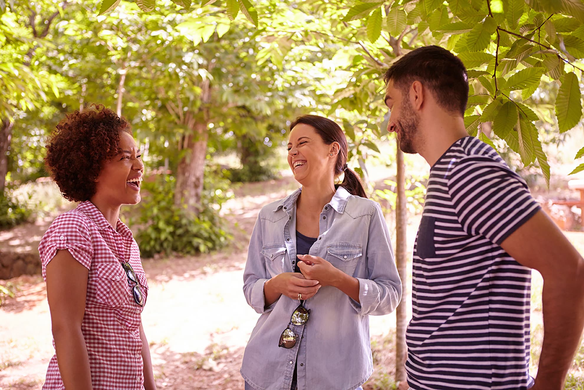 Three friends laughing together